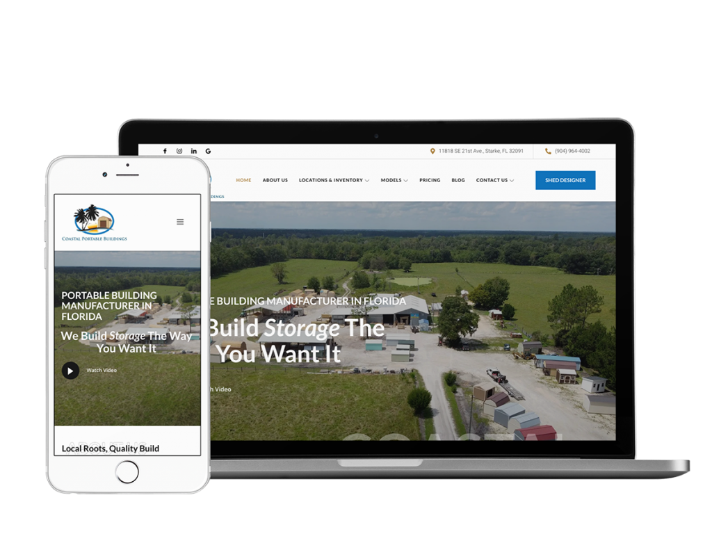 A portable tablet displaying a website for Coastal Portable Buildings, a construction company.