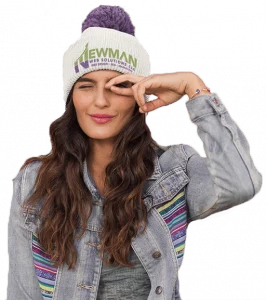 A web designer wearing a purple beanie with Newman Web Solutions logo on it.
