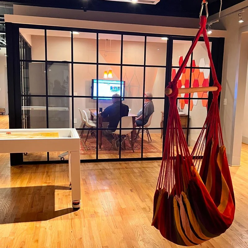 Instagram Marketing Agency 7 A room with a hammock ideal for digital marketing experts seeking relaxation.