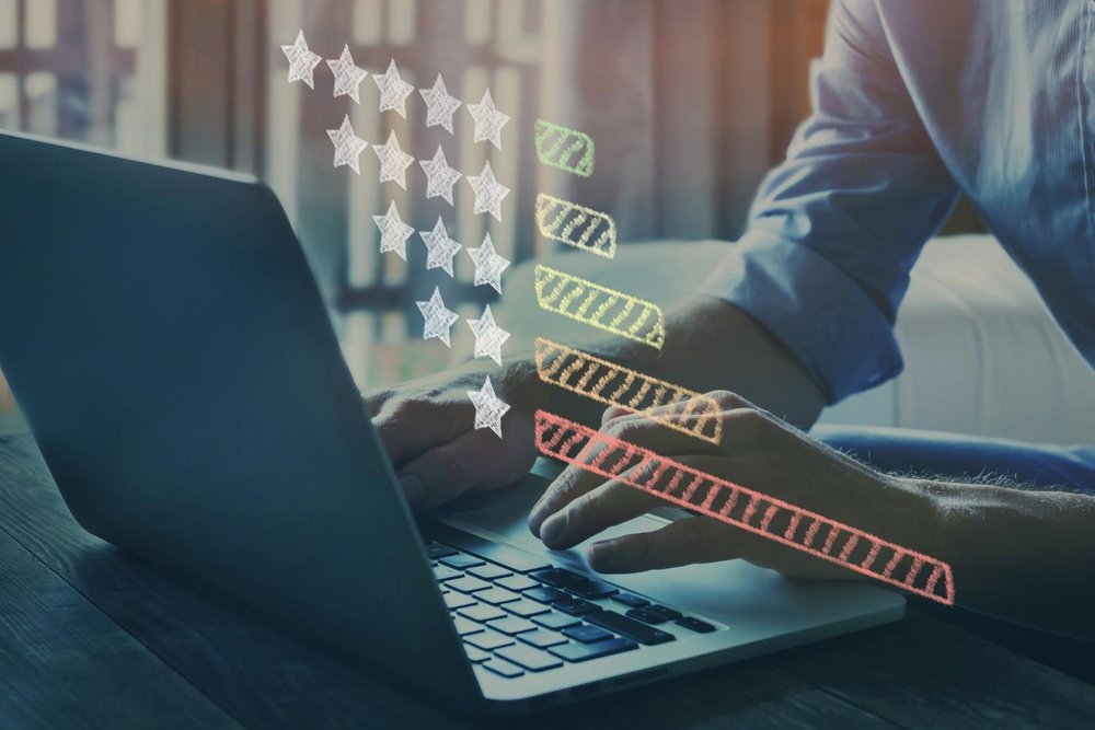 Boost Local SEO: Master Long Tail Keywords 5 A man analyzing online reviews on his laptop.