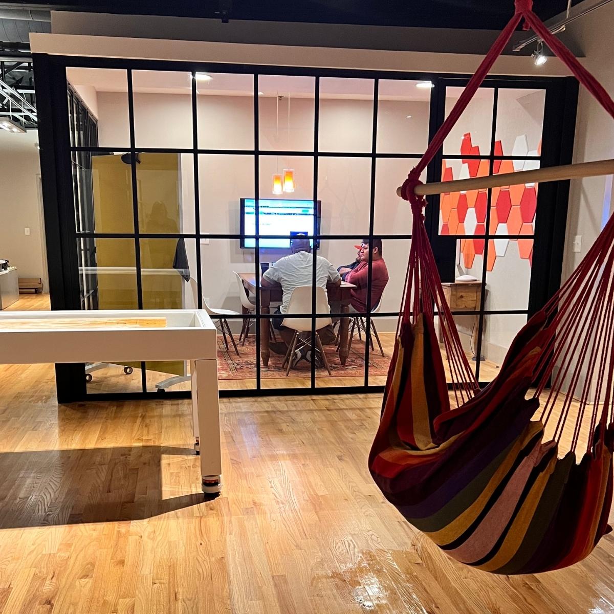 An office with a hammock chair, designed by a Marietta marketing agency, specializing in SEO and web design.