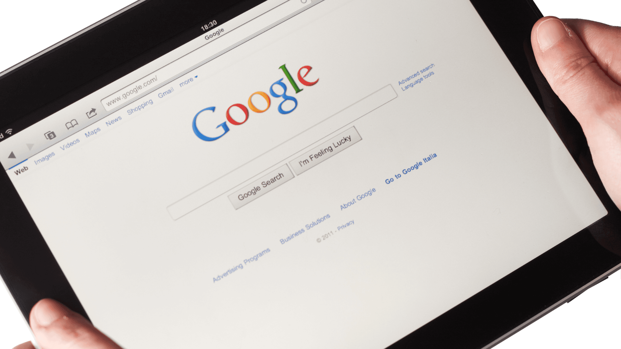 A person using a tablet to get Google to index their site.