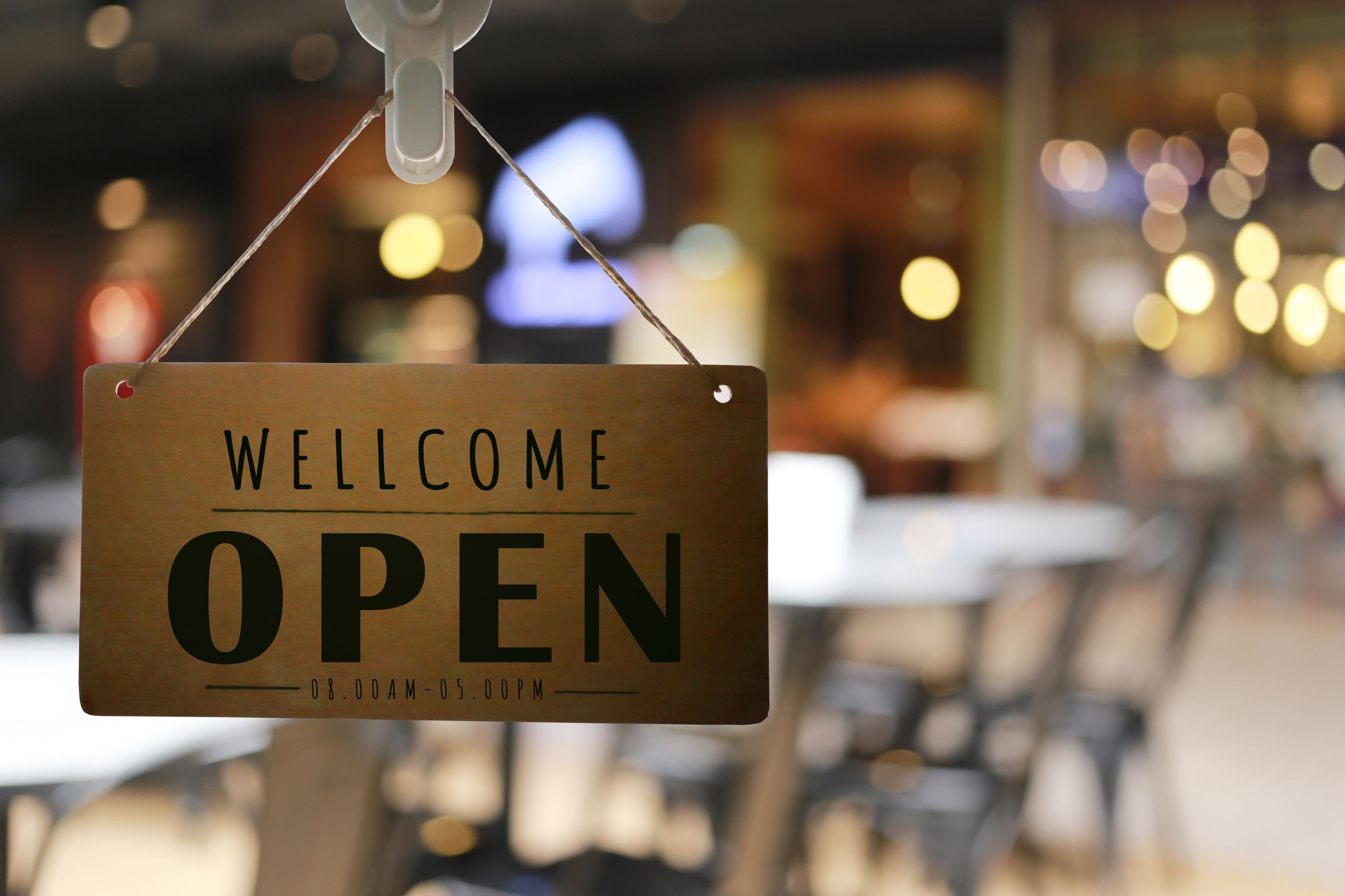 A restaurant displaying a welcome open sign on Bing Places for Business.