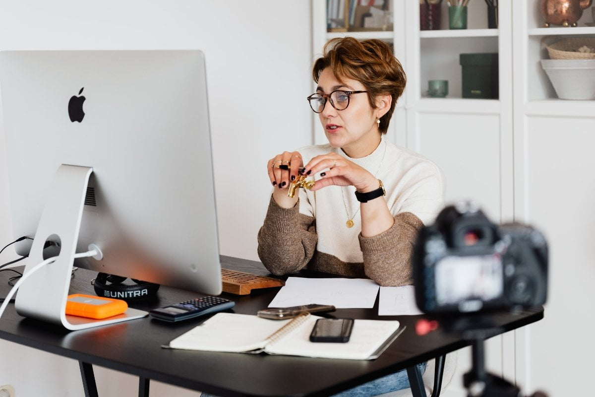 A woman performing WordPress installation on her computer.