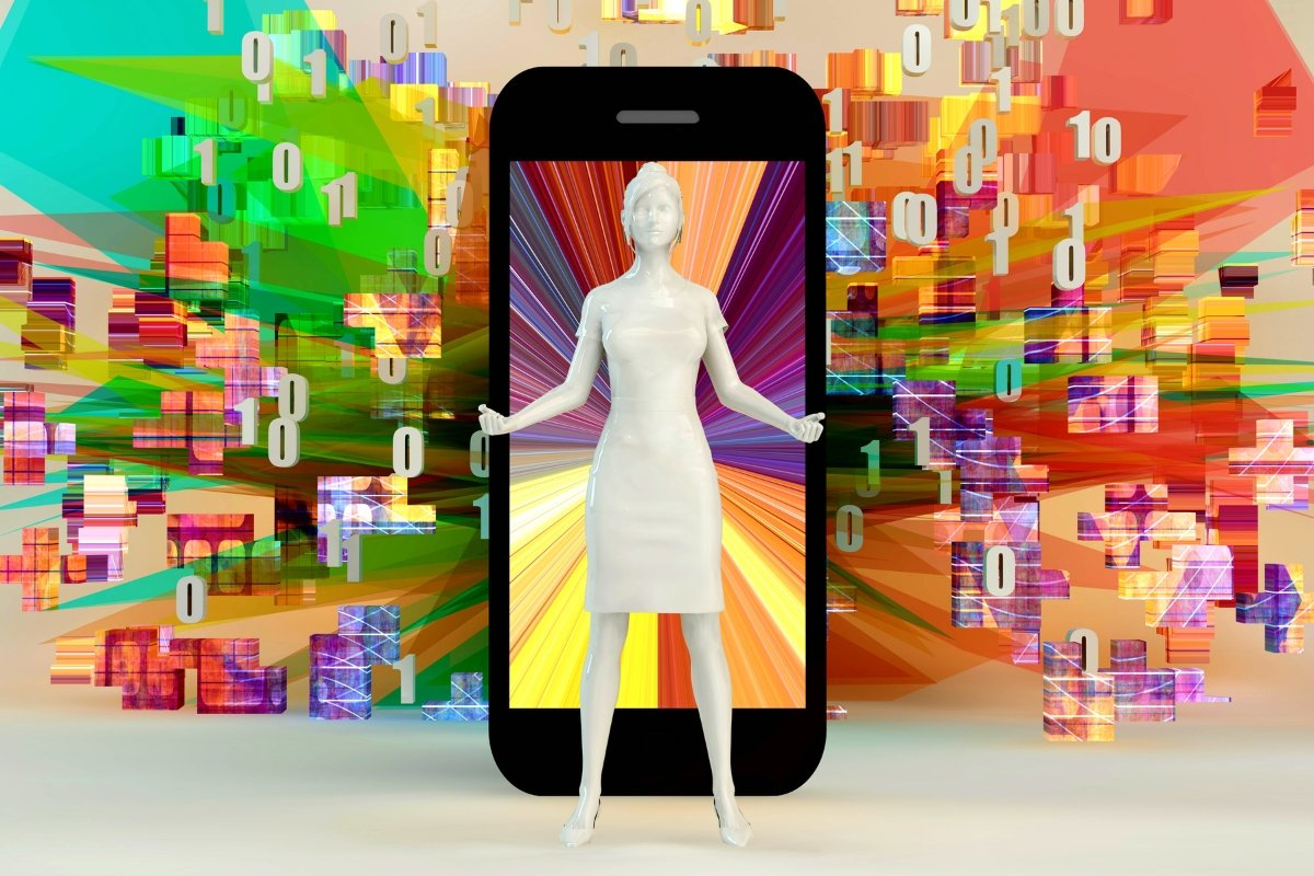 A woman is standing in front of a colorful, responsive phone.
