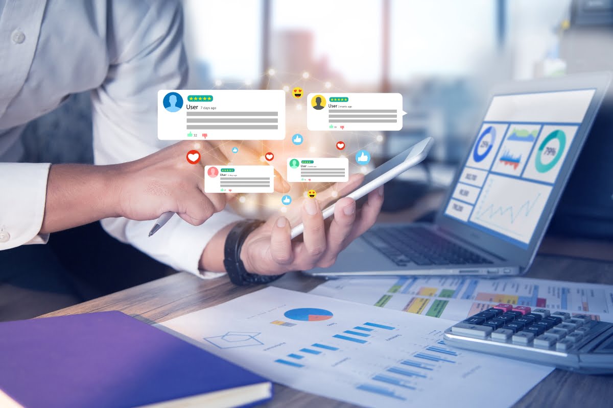 SEO Geo-Targeting: Your Roadmap to Success 4 A man showcasing the value proposition of social media icons on a laptop.