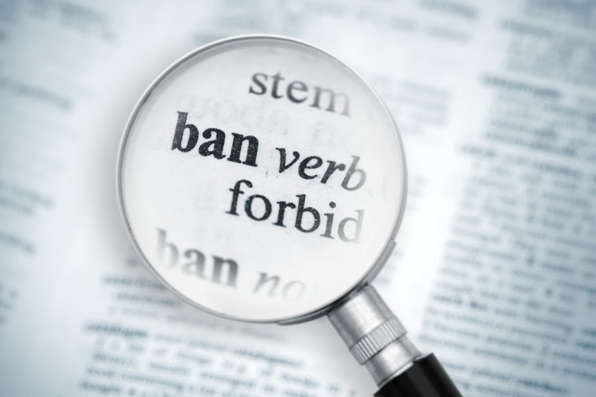 Shadow Banning on Social Media 4 A magnifying glass with the concept of shadow banning.