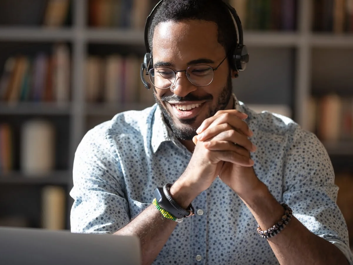 3 Pillars of Effective Website Maintenance 1 A man wearing headphones is effectively maintaining a website.