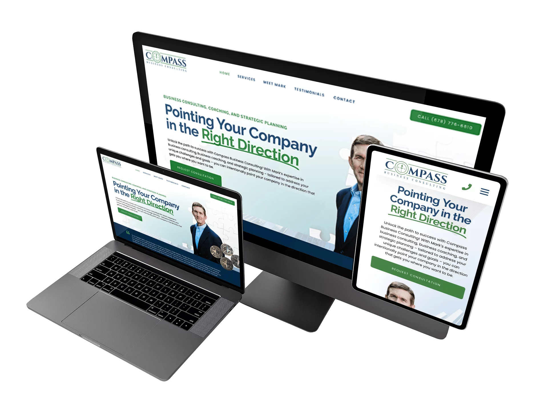 A laptop, tablet, and phone displaying a website for Compass Business Consulting.