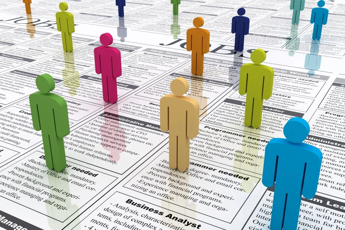 Maximize Your Reach with HVAC Local Service Ads 2 A group of people reading a newspaper with HVAC service ads.