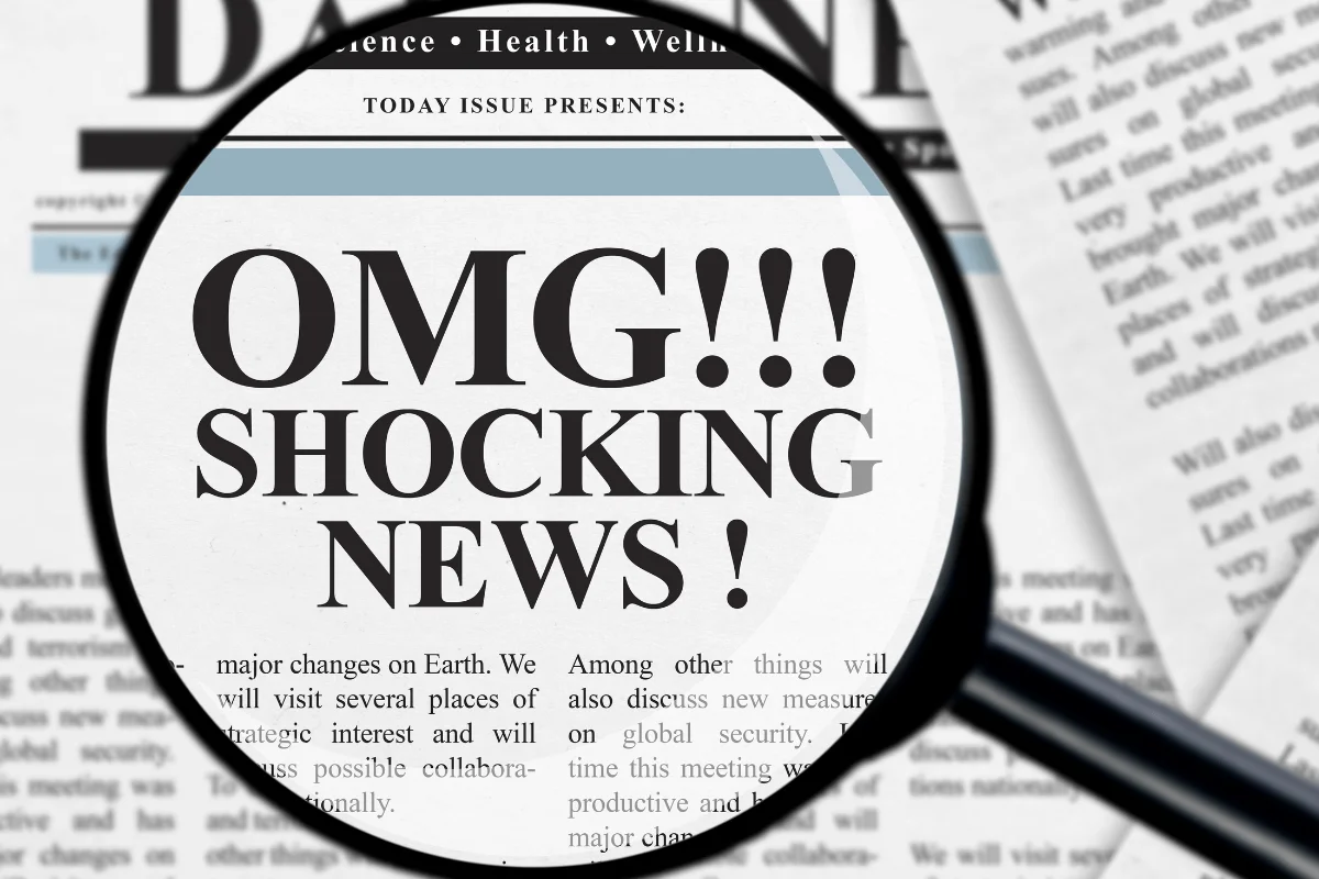 Copy That Converts: The Power Of Persuasive Writing Techniques 2 A captivating copy that converts instantly catches your attention through a magnifying glass with the words "OMG" - truly shocking news!