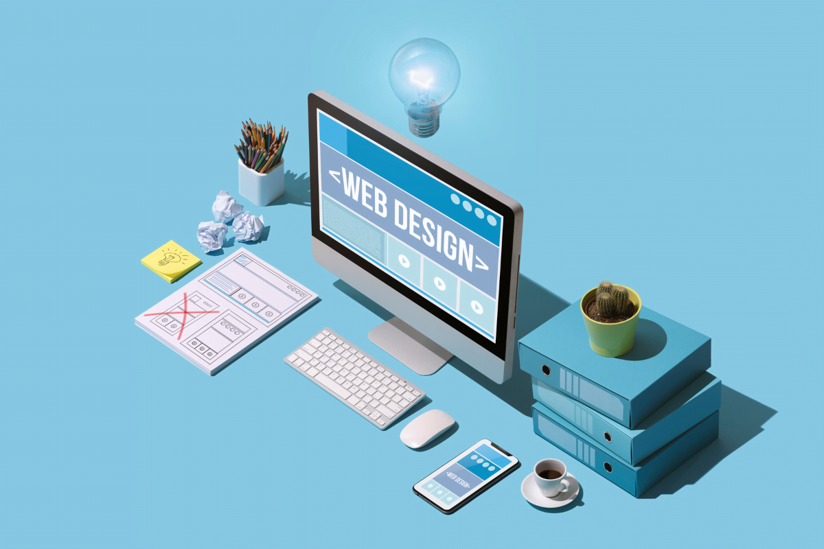 How To Design A Website: A Step-By-Step Guide For Beginners 1 A computer displaying a web design with a light bulb and a stack of folders.