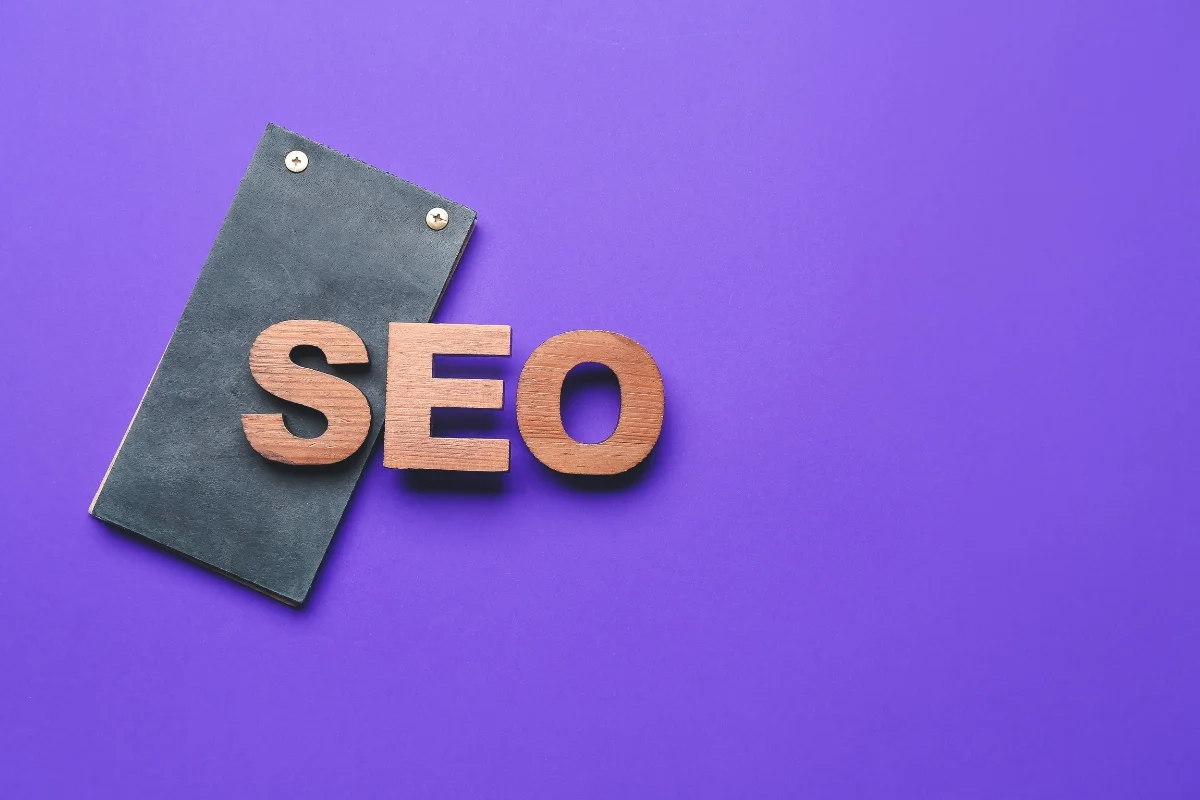 E-E-A-T in SEO: Unraveling the Secret Sauce of Online Success 4 The word seo on a purple background, emphasizing E-E-A-T in SEO.