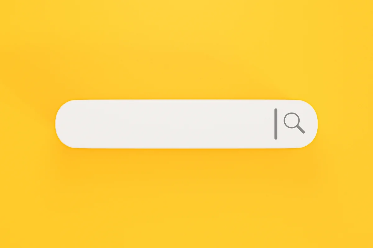 How to Search on a Website: Mastering the Art of Navigation 3 A minimalistic "how to search on a website" bar with a magnifying glass icon, centered on a vibrant yellow background.