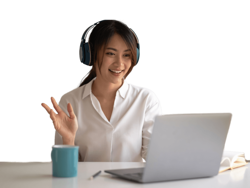 Smiling woman wearing headphones, engaging with a laptop, representing effective communication and customer relationship management for small businesses.